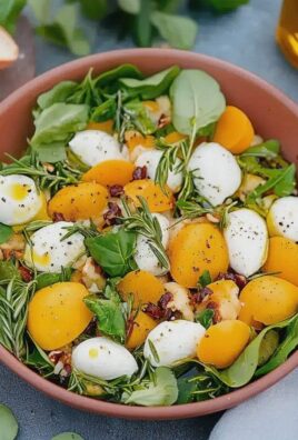 Rucola Mango Salat mit Pinienkernen für den Sommer