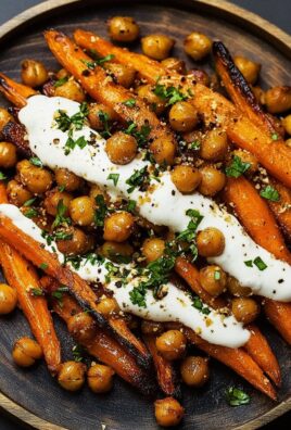 Spicy Maple-Roasted Carrots with Crispy Chickpeas and Yogurt Sauce